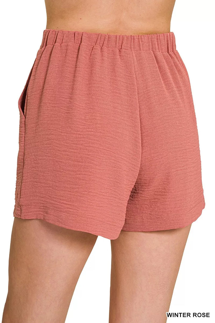 Pleated woven shorts with back elastic waist and pockets