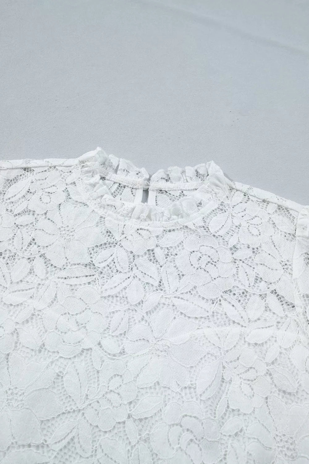 Sheer floral lace blouse with ruffle mock neck and flounce sleeves