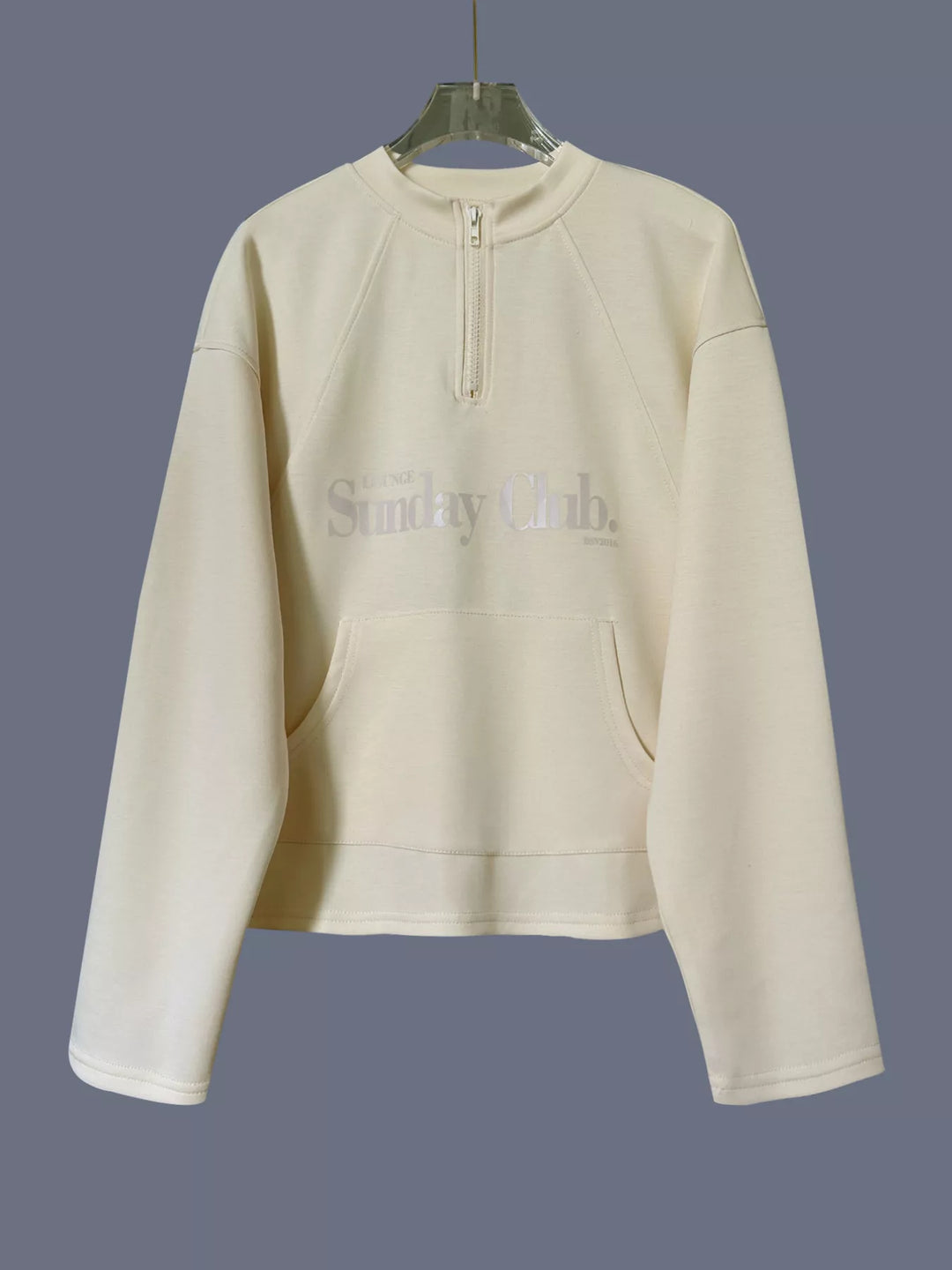 Quarter-zip raglan pullover sweatshirt with front pocket