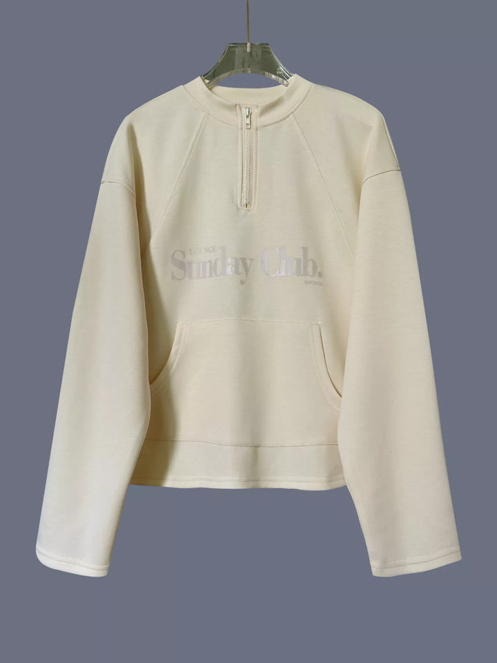 Quarter-zip raglan pullover sweatshirt with front pocket