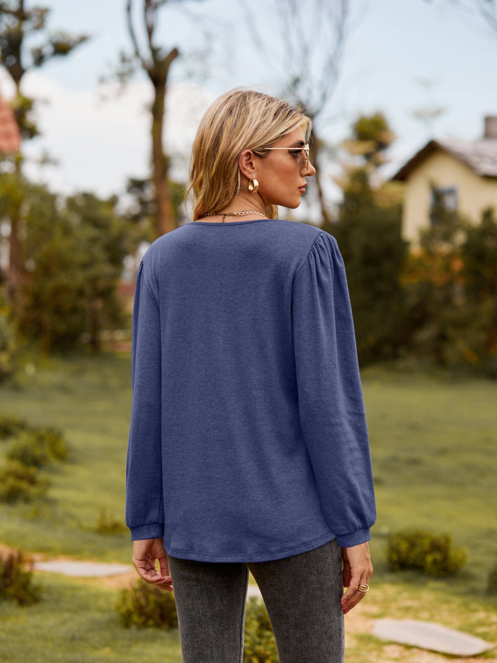 Ruffle trim puff sleeve split-neck blouse