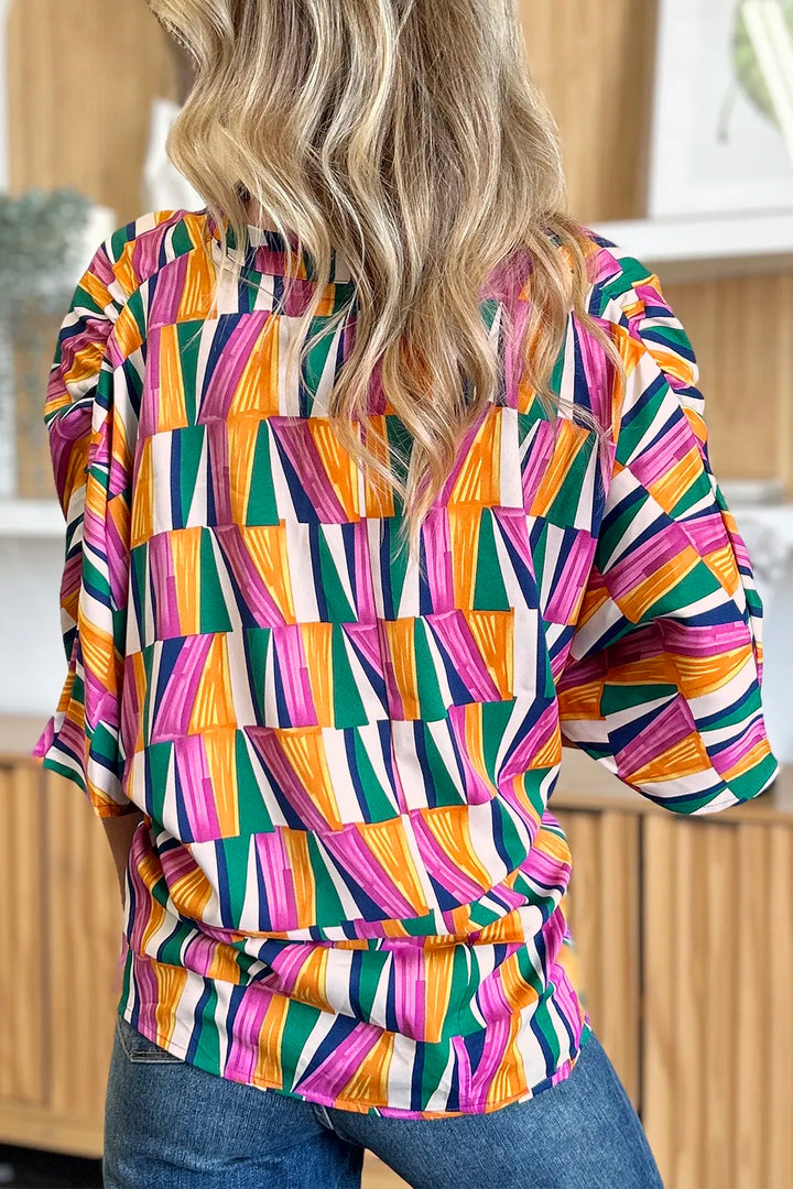 Geometric print notched neck dolman sleeve top