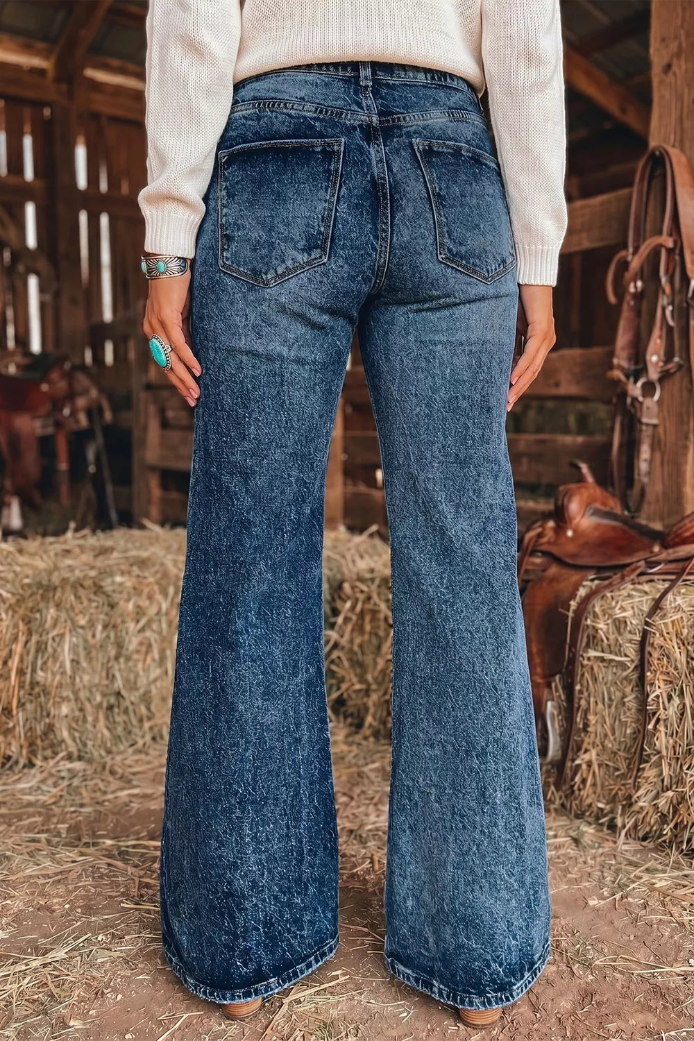 Acid wash high-rise wide flare jeans with double-button waist