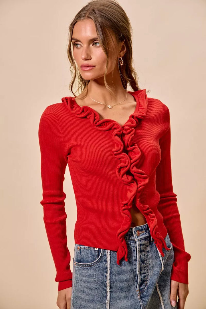 Ribbed knit cardigan with cascade ruffle trim