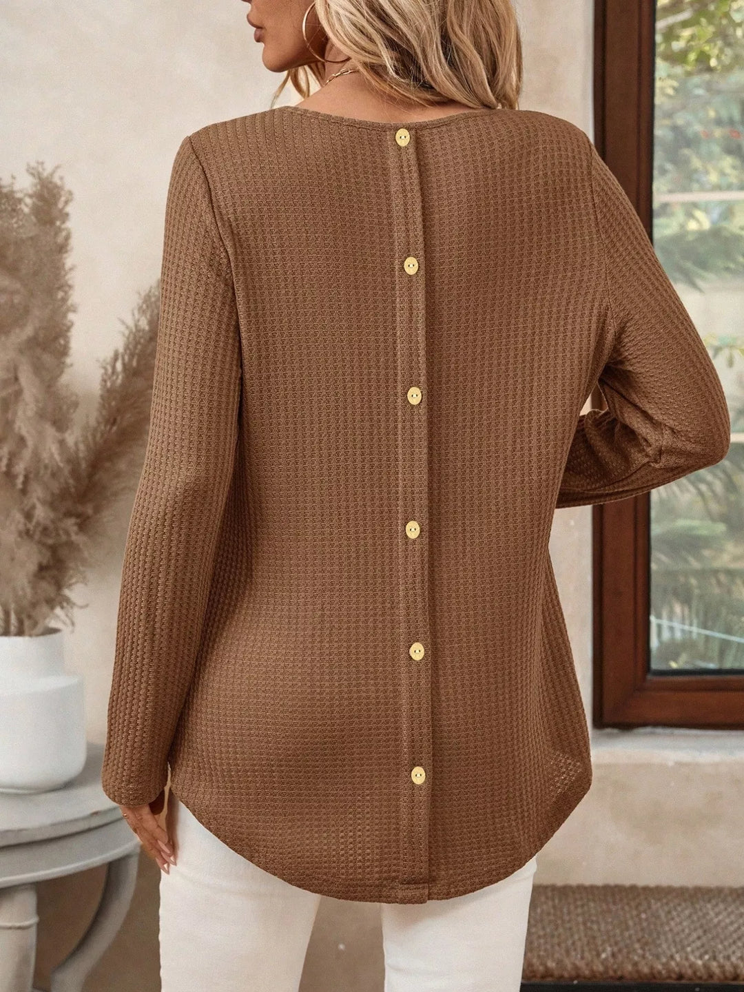 Waffle knit crew neck long sleeve top with curved hem