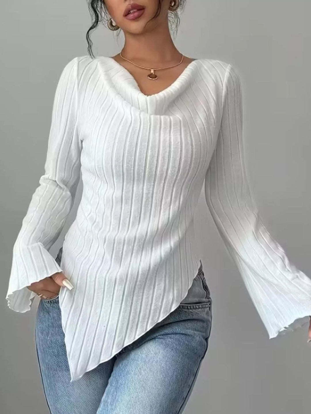 Ribbed knit top with asymmetric hem and flared sleeves