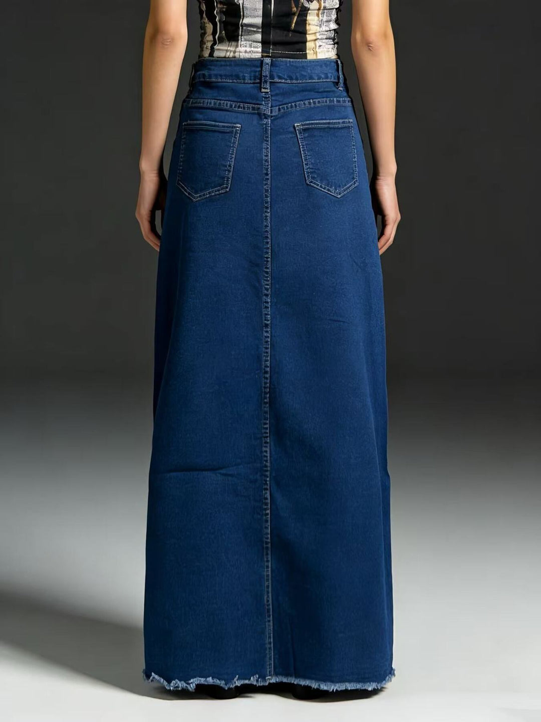 Raw hem maxi denim skirt with button closure and front pockets