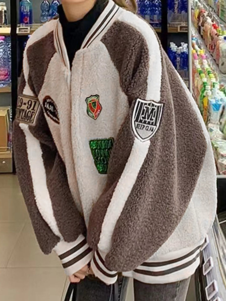 Zip-up sherpa fleece varsity jacket with embroidered patches