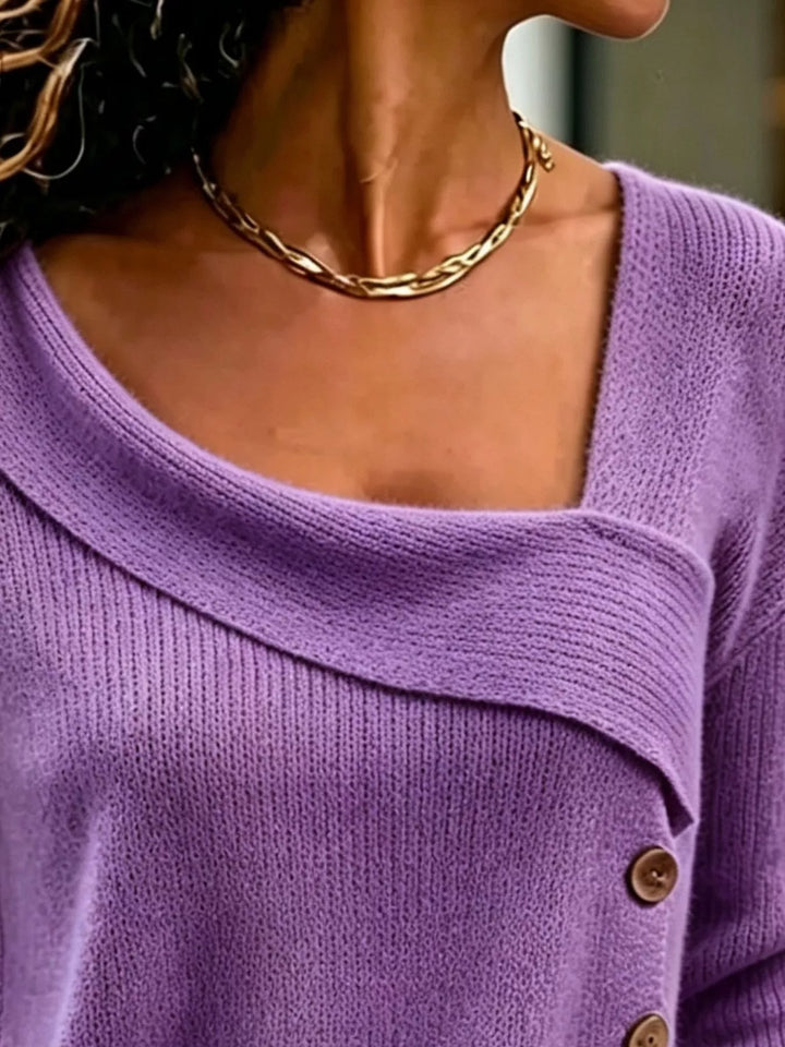 Asymmetrical button sweater with angled ribbed neckline
