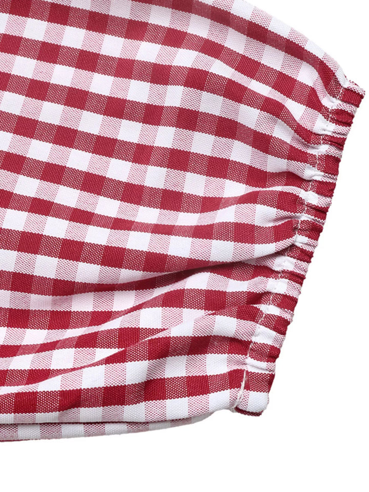 Backless gingham mini dress with bow tie and puff sleeves