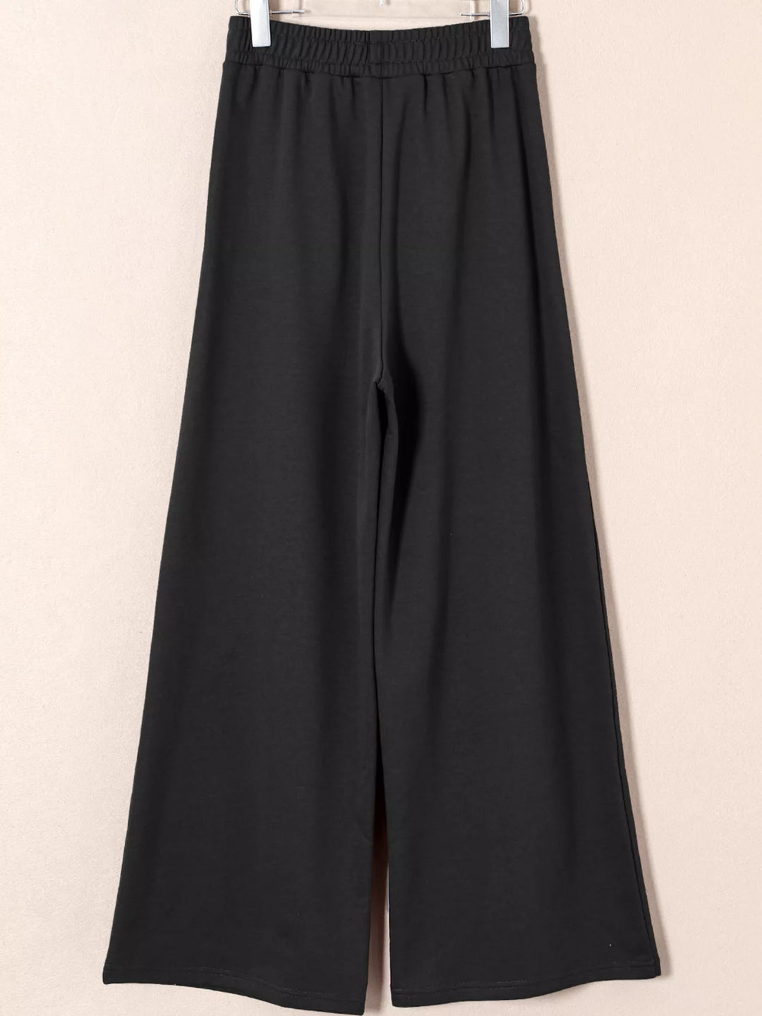 High-rise wide-leg pleated sweatpants with drawstring