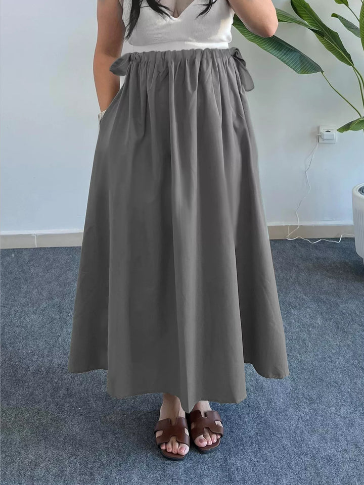 Gray A-line midi skirt with gathered bow-tie waist and pockets
