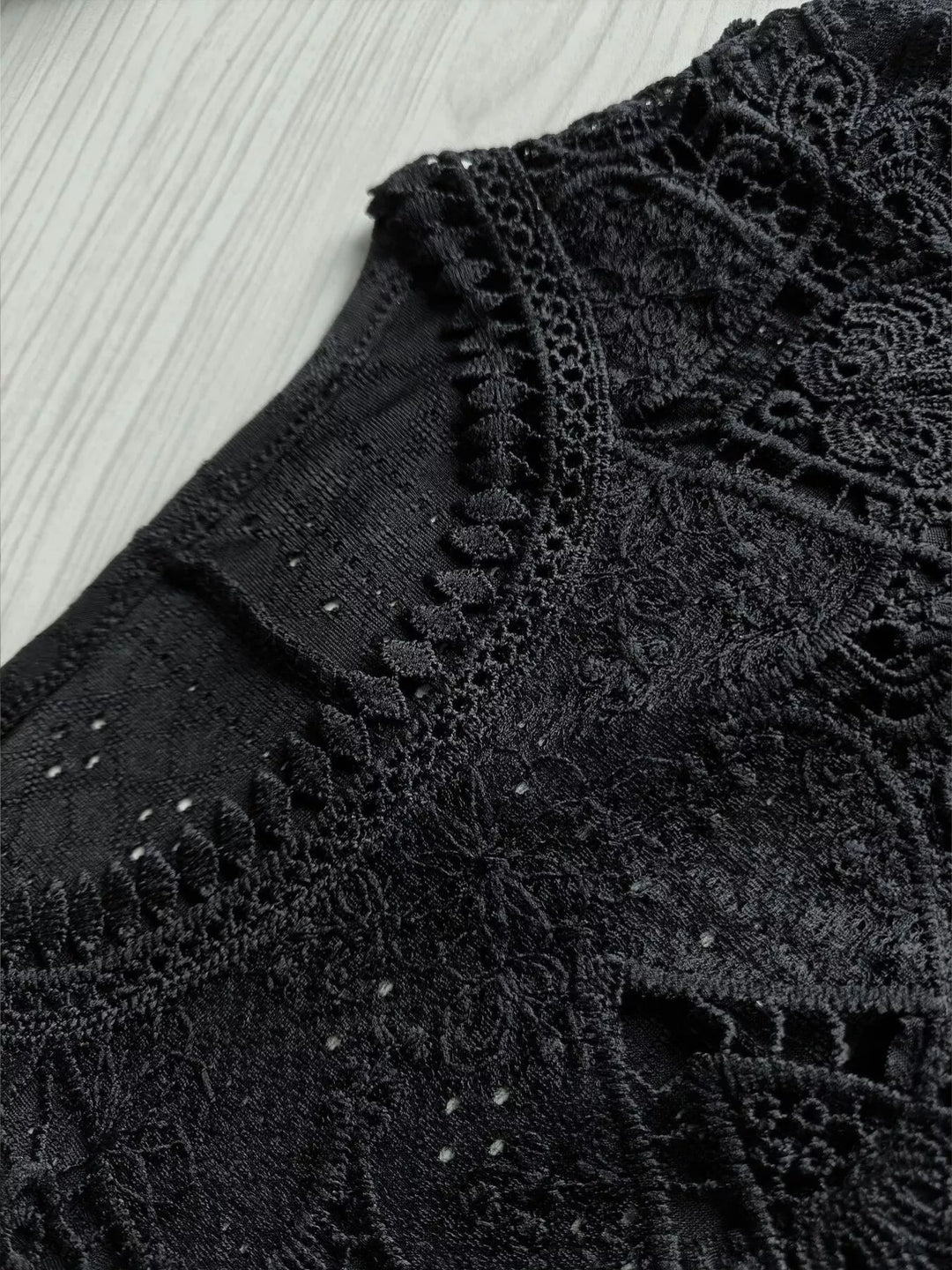 Lace yoke long sleeve top with textured eyelet knit