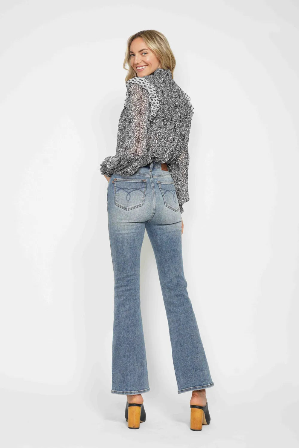 High-rise tummy control bootcut jeans with embroidered pockets