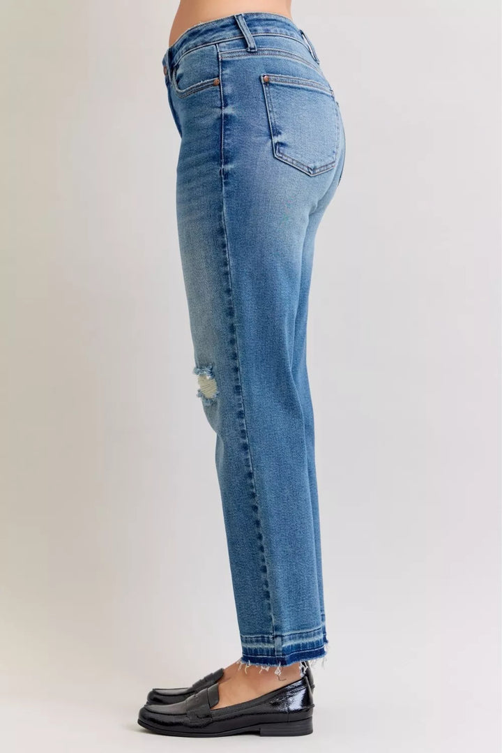 Distressed mid-rise boyfriend jeans with released raw hem