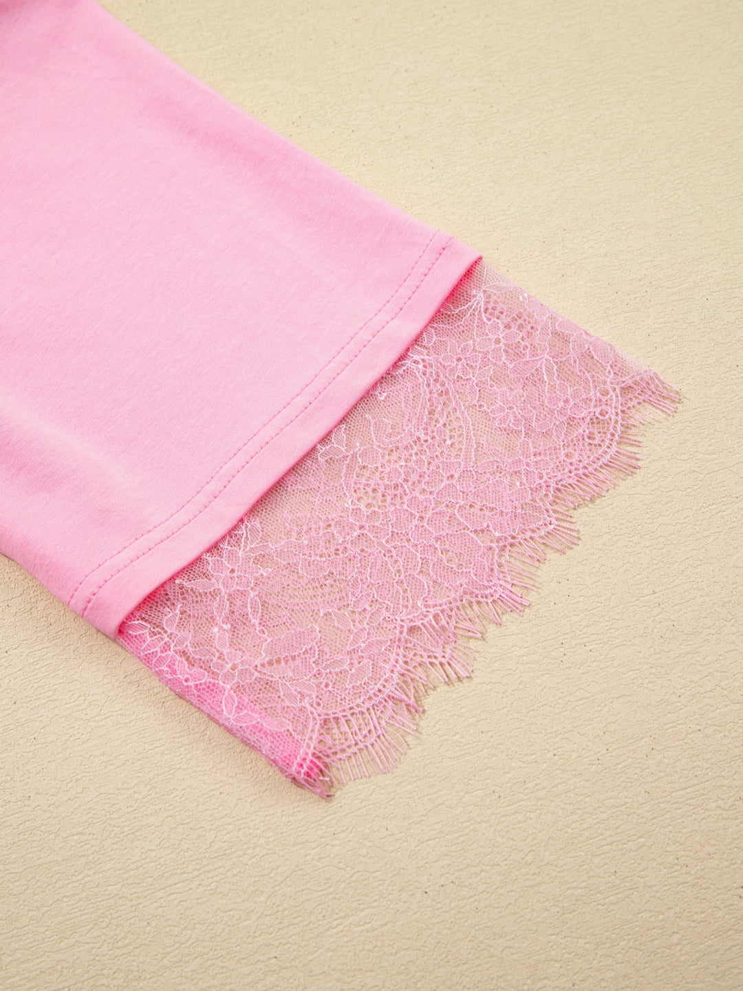 Oversized tee with floral lace back and sleeve trim