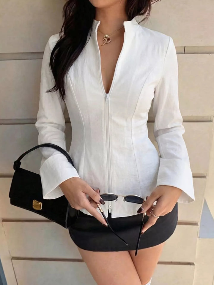 Ivory Zip-front mock neck top with flared cuffs