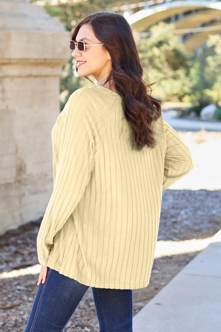 Relaxed ribbed knit round neck long sleeve top