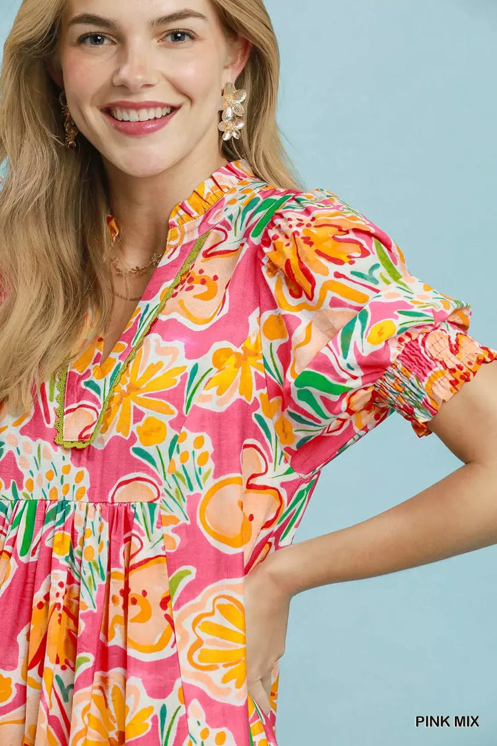 Bold floral puff sleeve tiered midi dress with pockets