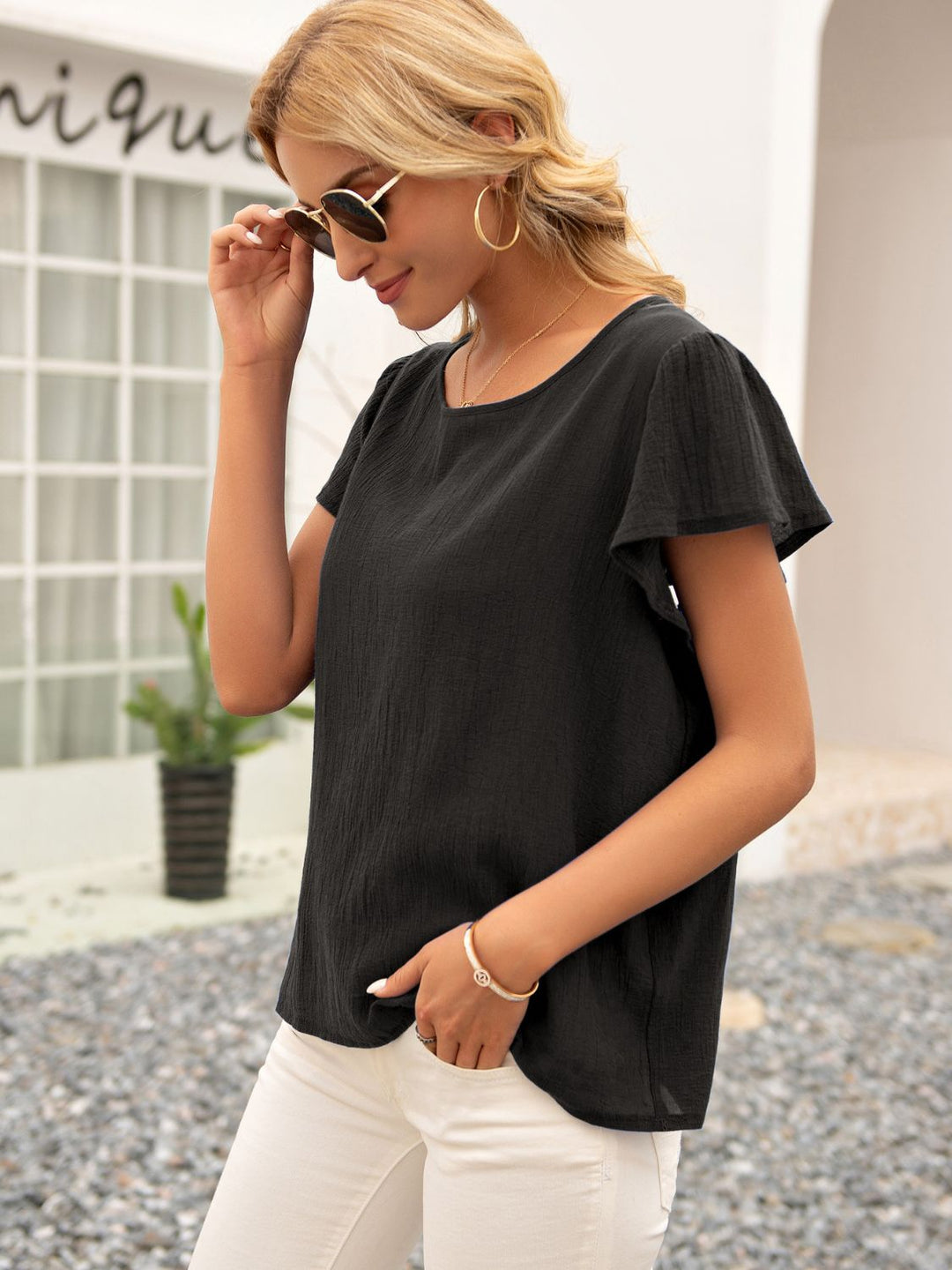 Tie-back cutout top with flutter sleeves