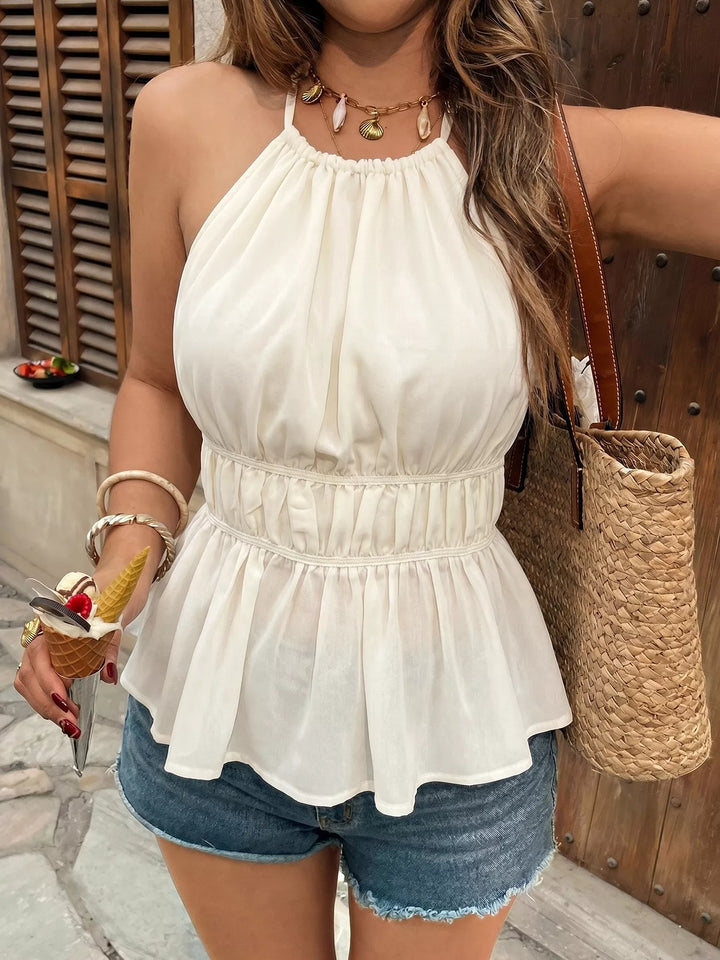 Halter neck peplum top with ruched waist