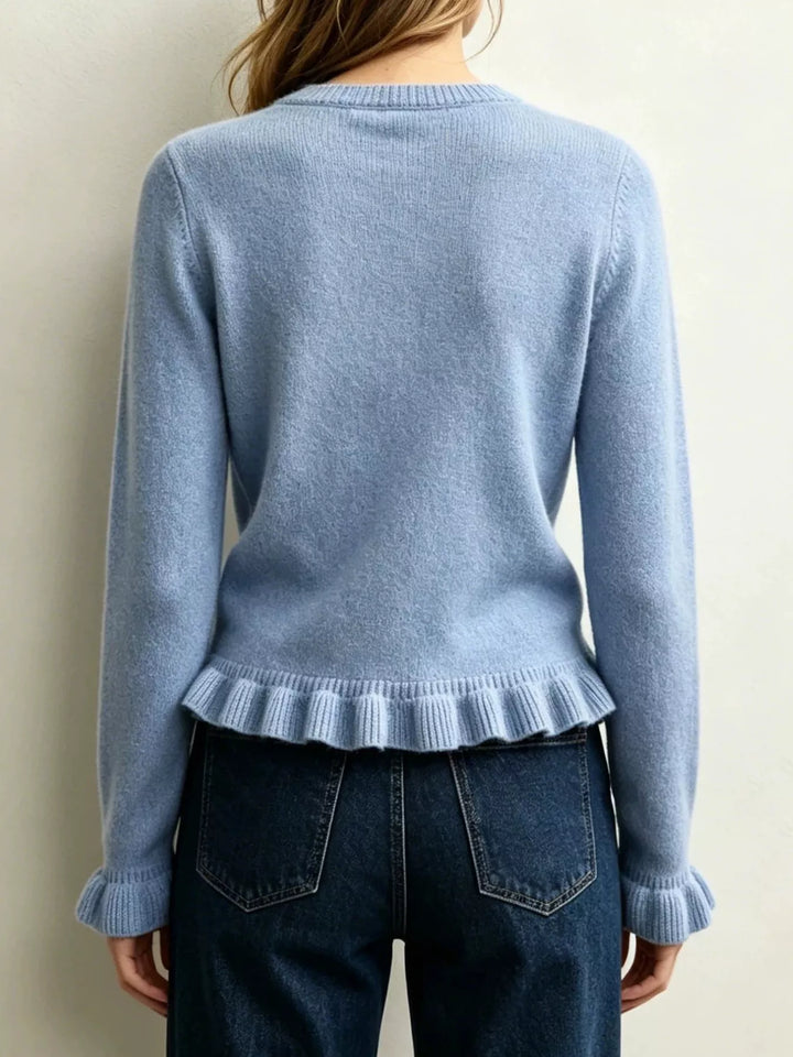 Ruffle hem crew neck knit sweater with ruffled cuffs