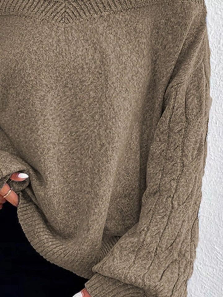 Cold-shoulder cable-knit turtleneck sweater