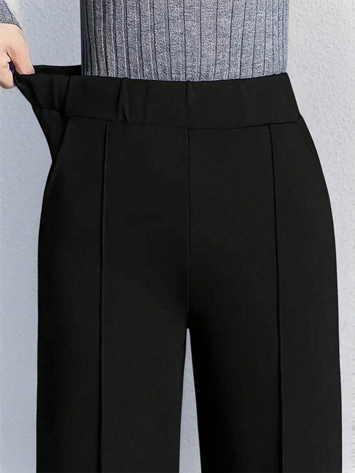 High-waisted wide-leg pintuck pants with pockets