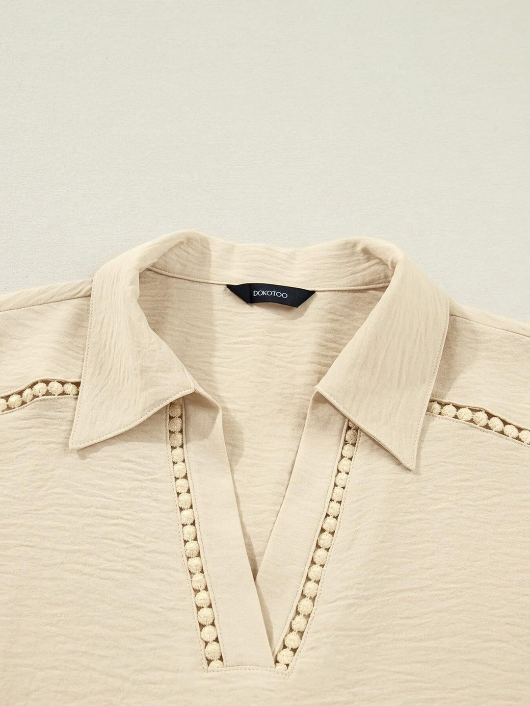 Johnny collar blouse with crochet lace trim and roll-tab sleeves