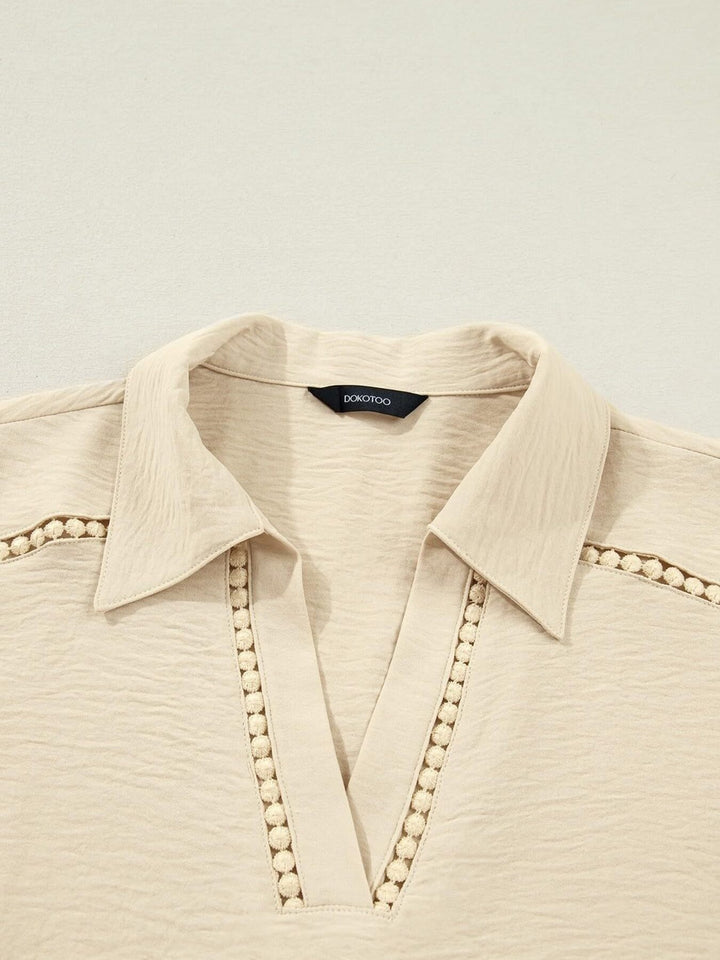 Johnny collar blouse with crochet lace trim and roll-tab sleeves