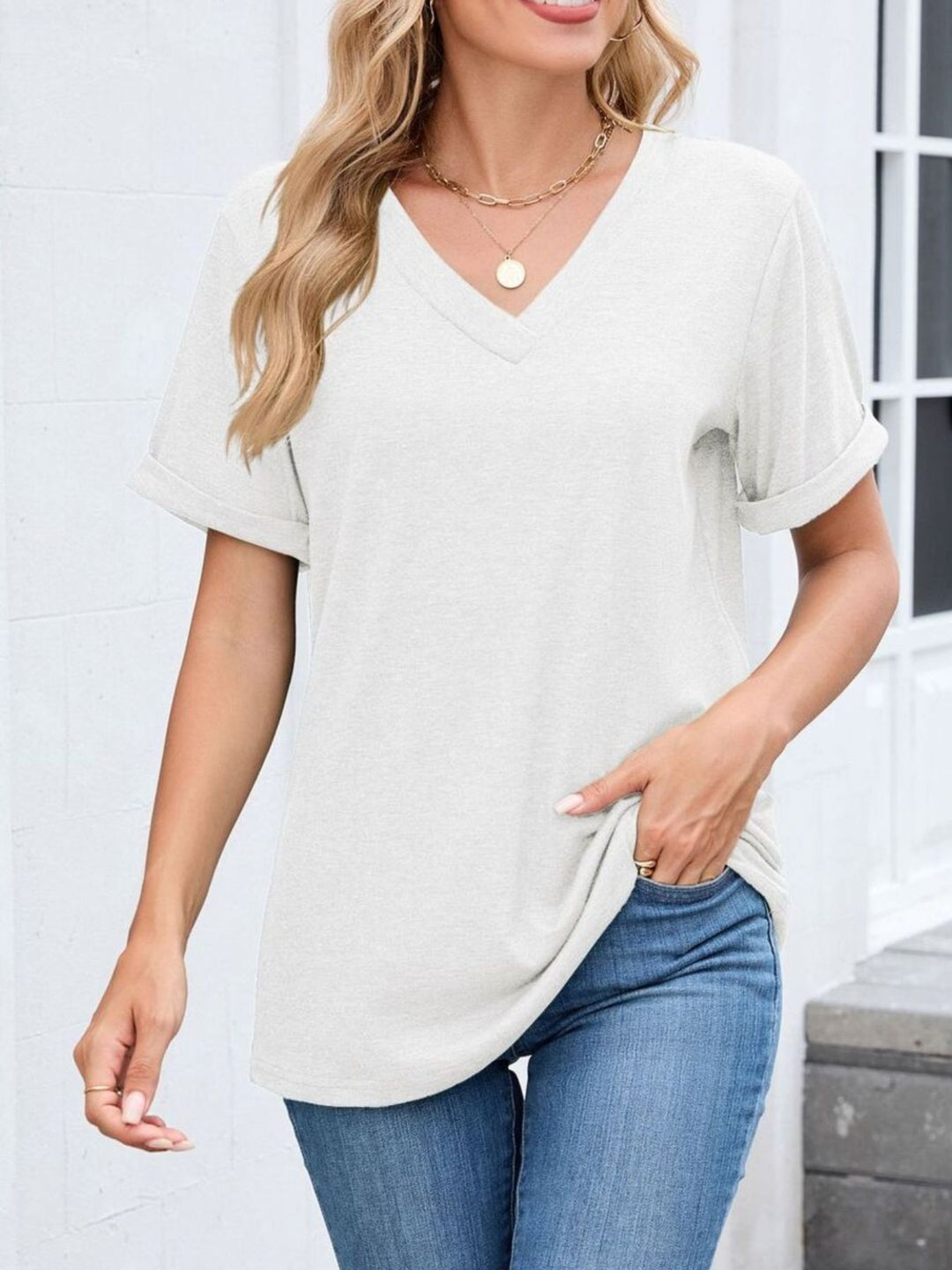 Relaxed V-neck short sleeve tee with rolled cuffs