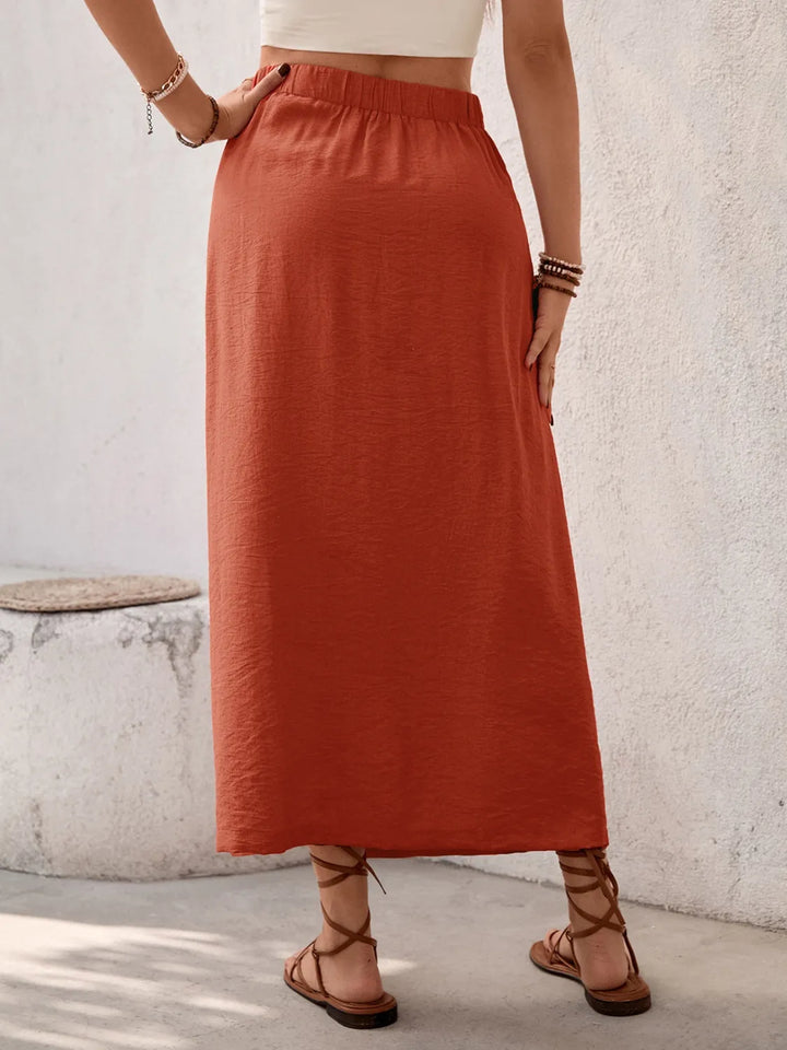 Front-slit midi skirt with twist waist detail