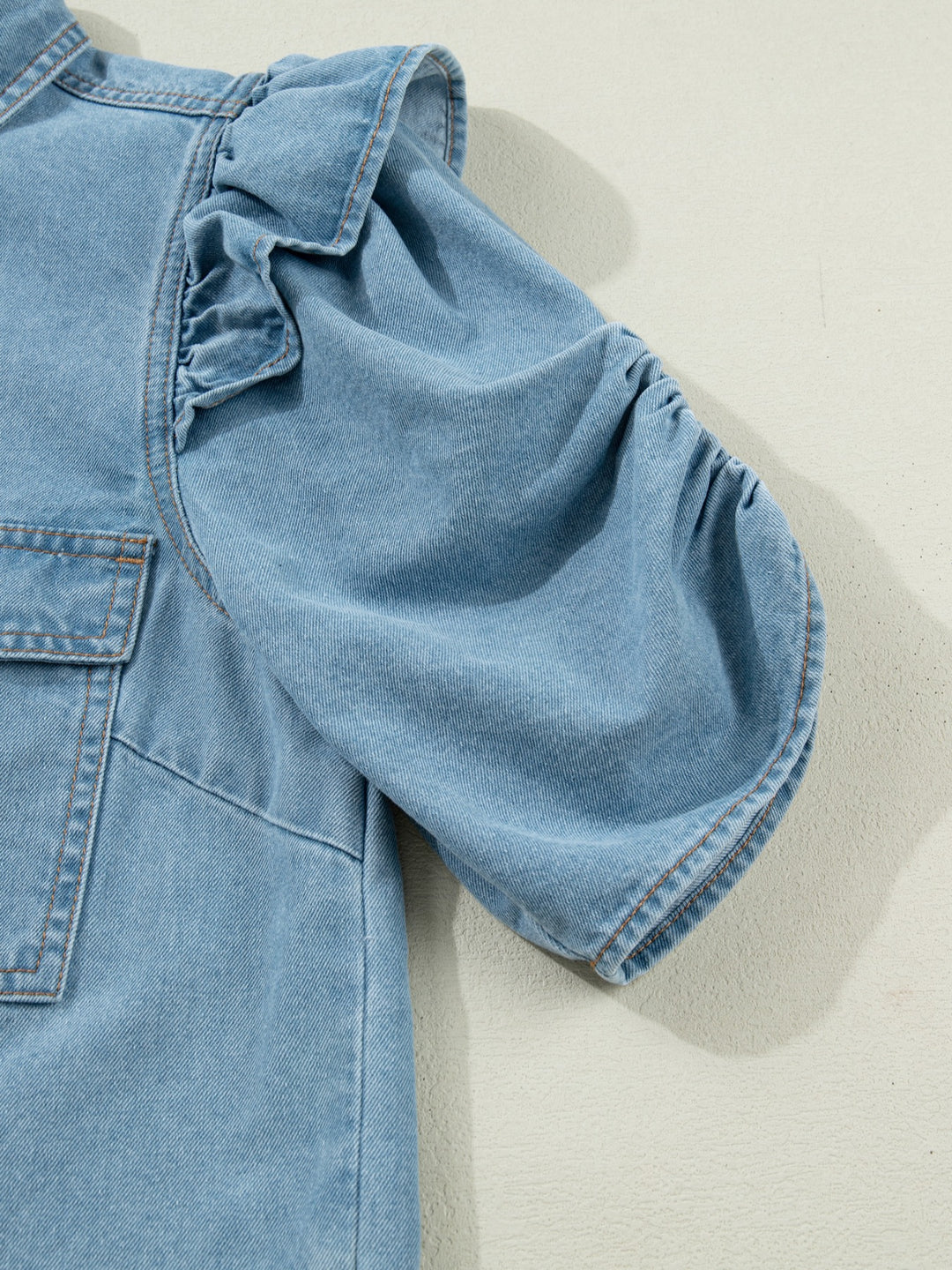 Ruffled cap-sleeve denim button-down shirt with flap pockets