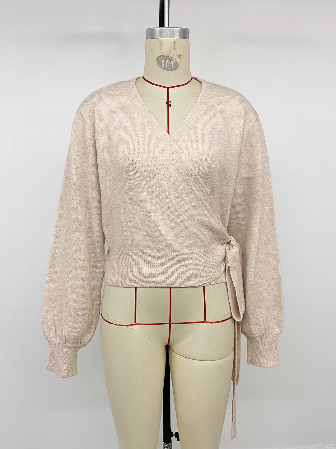 Surplice wrap sweater with side tie and drop shoulders