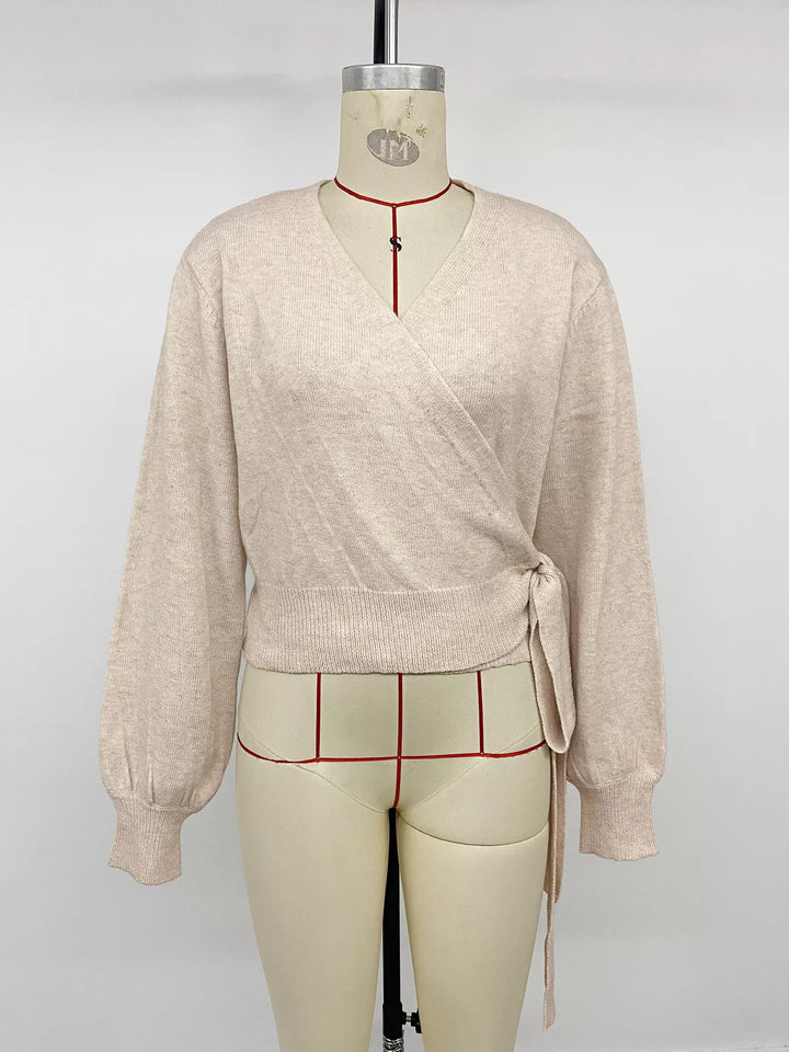Surplice wrap sweater with side tie and drop shoulders