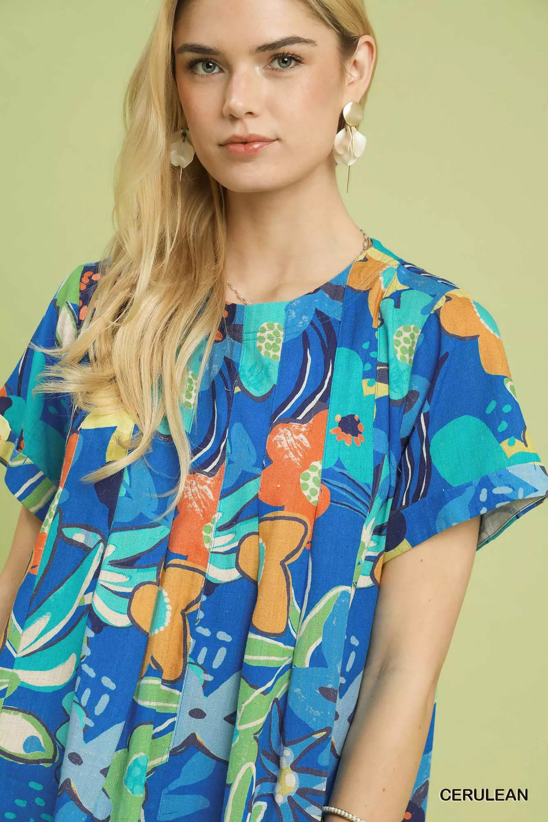 Abstract floral pleated blouse with keyhole back