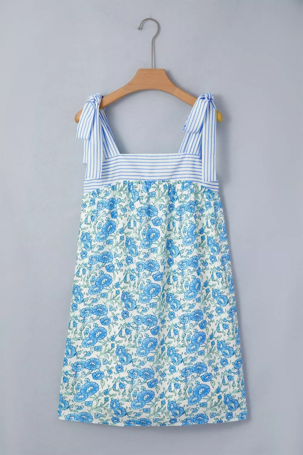 Floral babydoll mini dress with striped tie straps