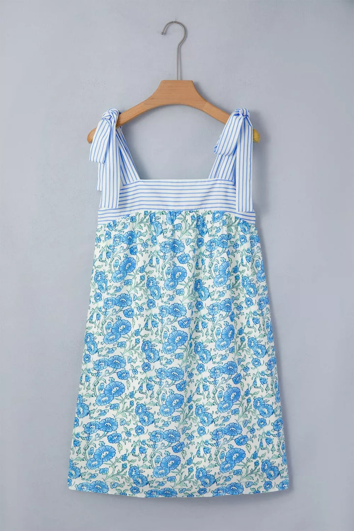 Floral babydoll mini dress with striped tie straps