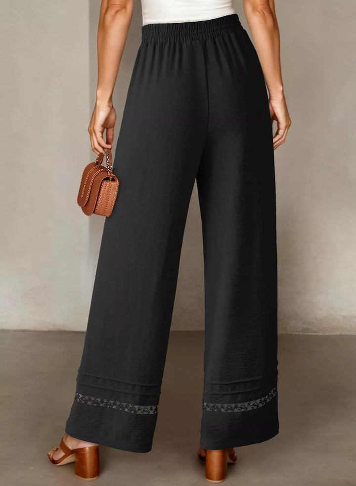 Wide leg drawstring pants with embroidered lace hem