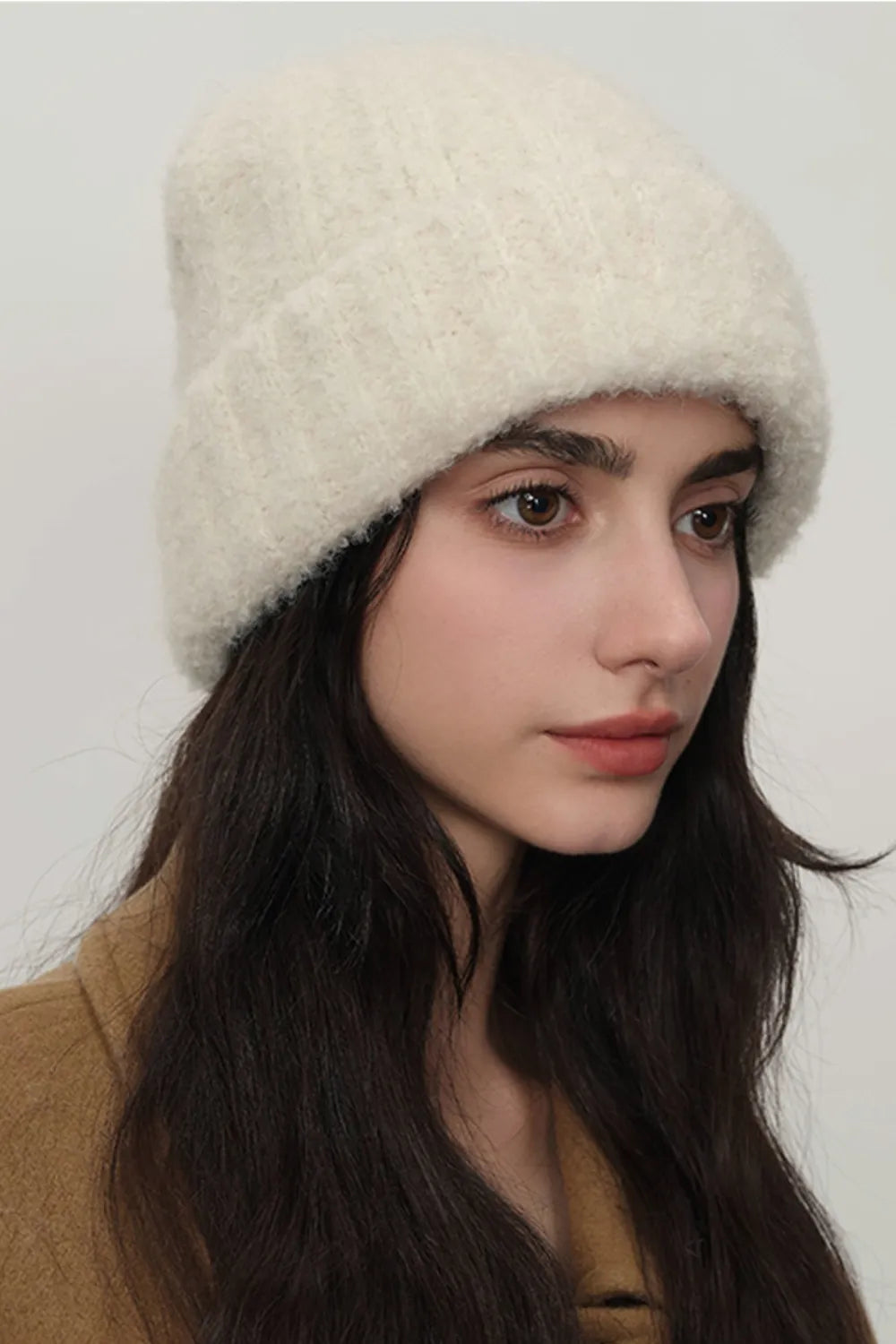 Cream Fuzzy brushed knit cuffed beanie with slouchy crown