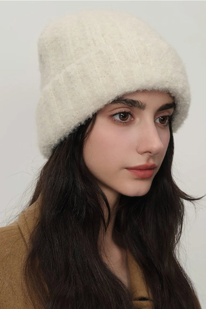 Cream Fuzzy brushed knit cuffed beanie with slouchy crown