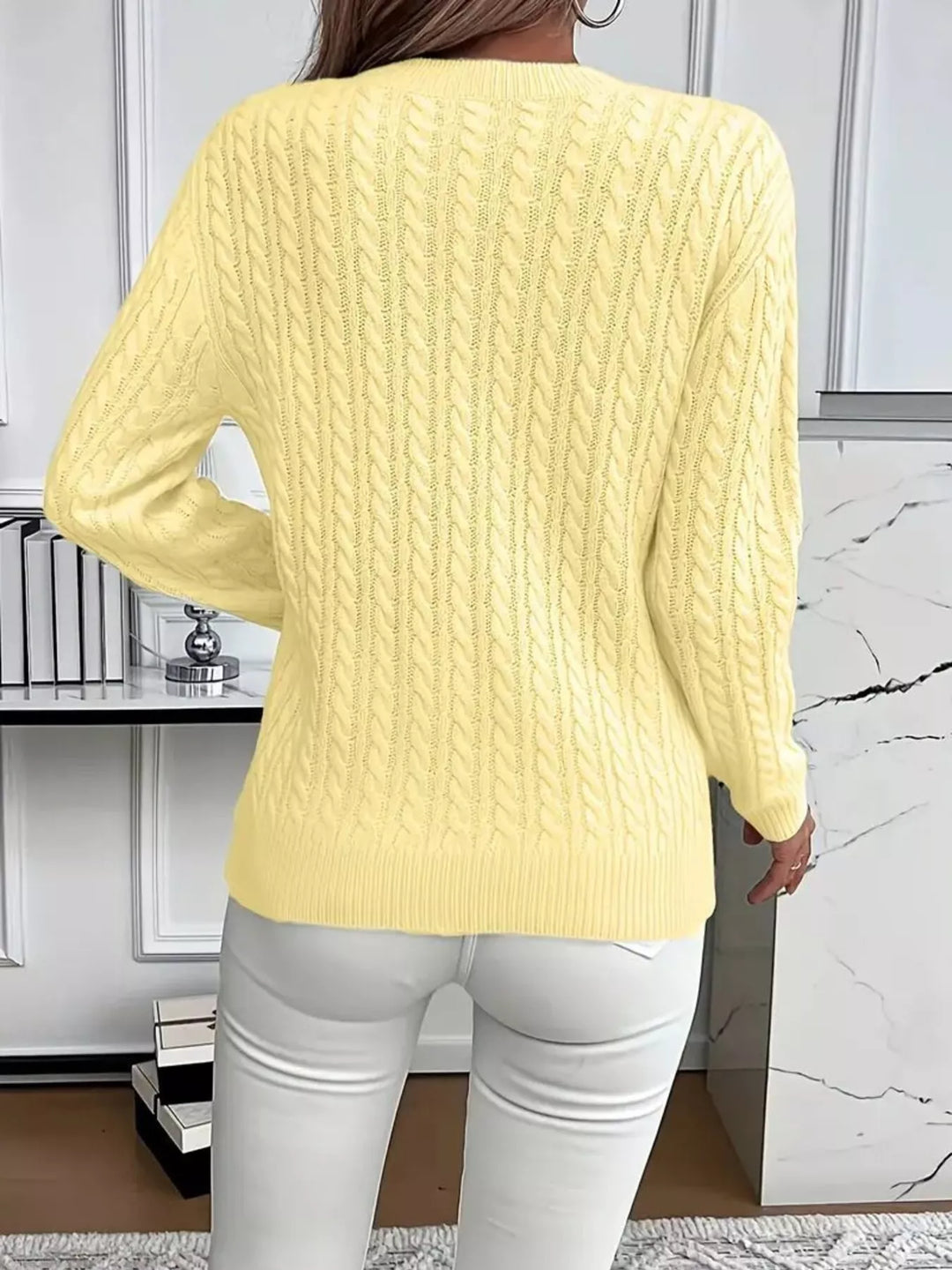 Cable knit crew neck pullover sweater with ribbed trim
