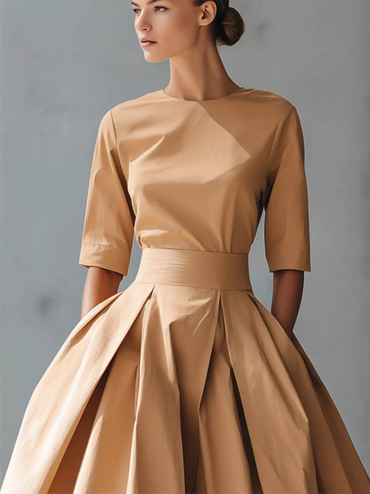 A-line pleated midi dress with side pockets