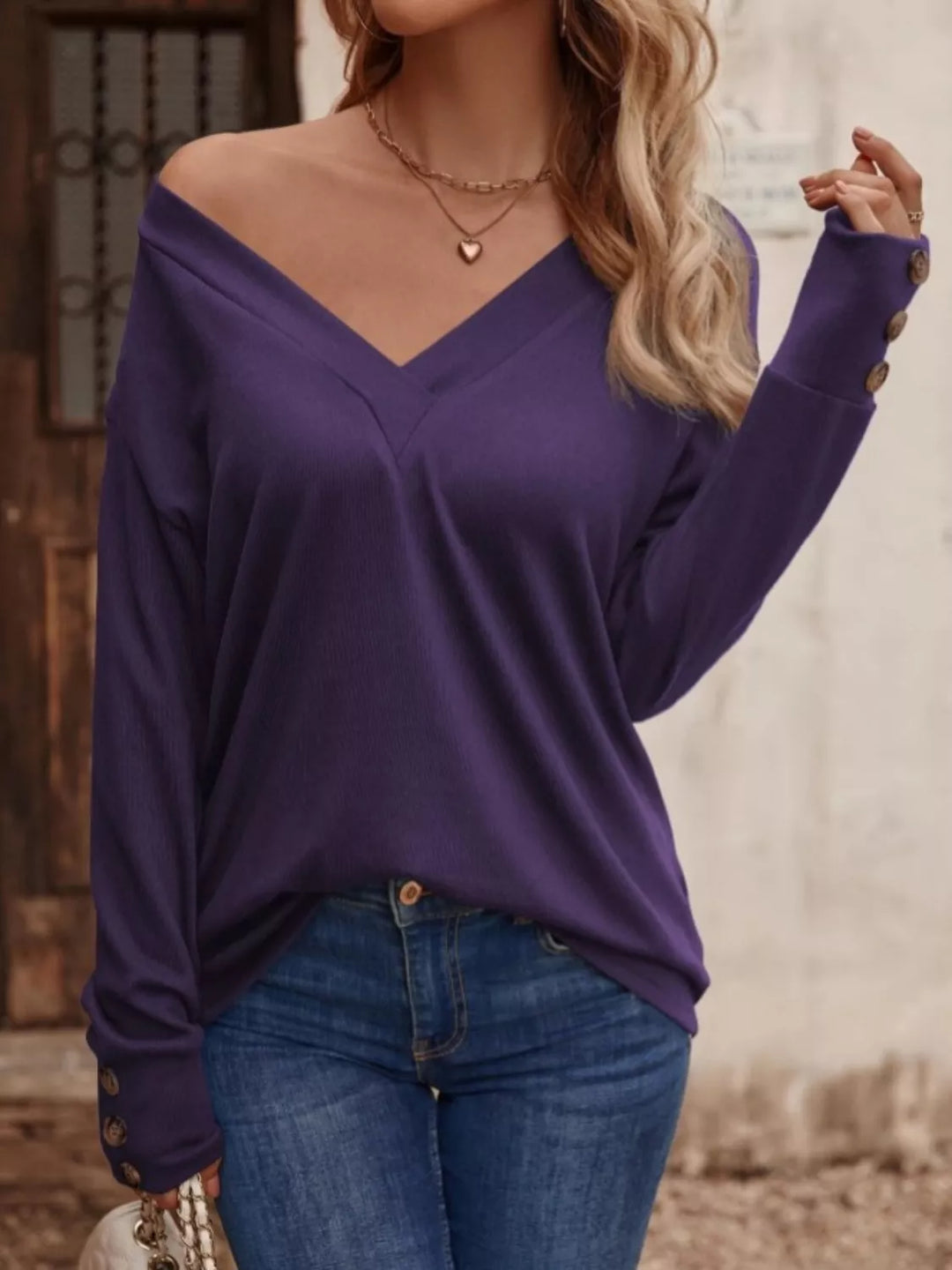 V-neck long sleeve top with button cuffs