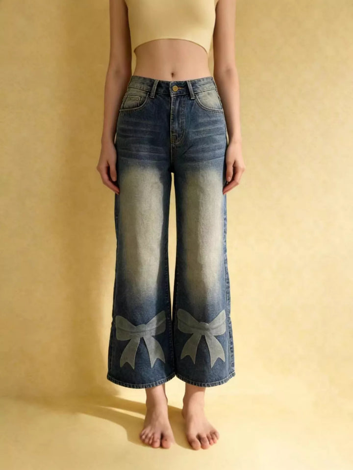 Blue Bow-detail wide leg jeans with faded whiskering