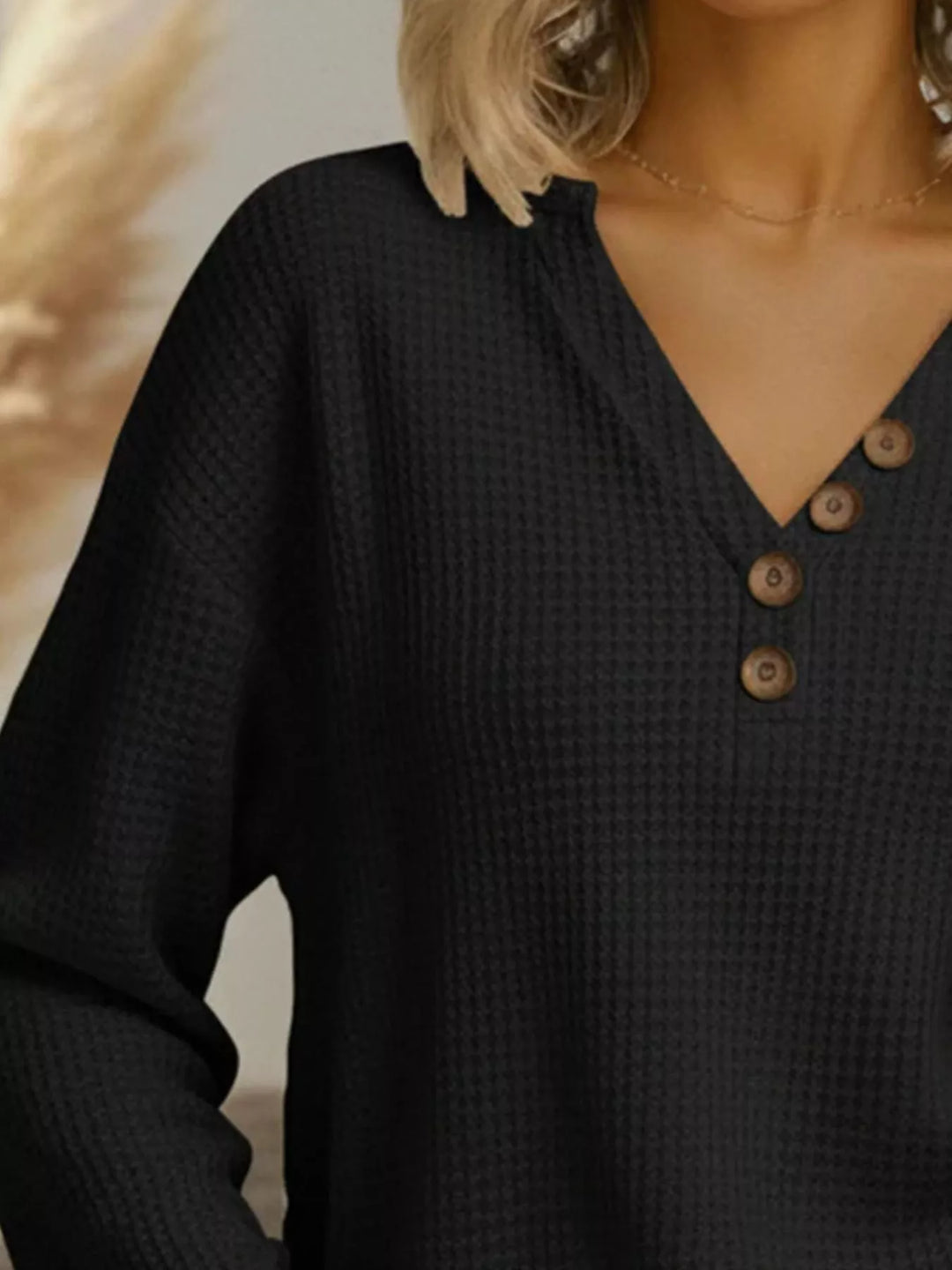 Waffle-knit long sleeve henley top with buttoned V-neck