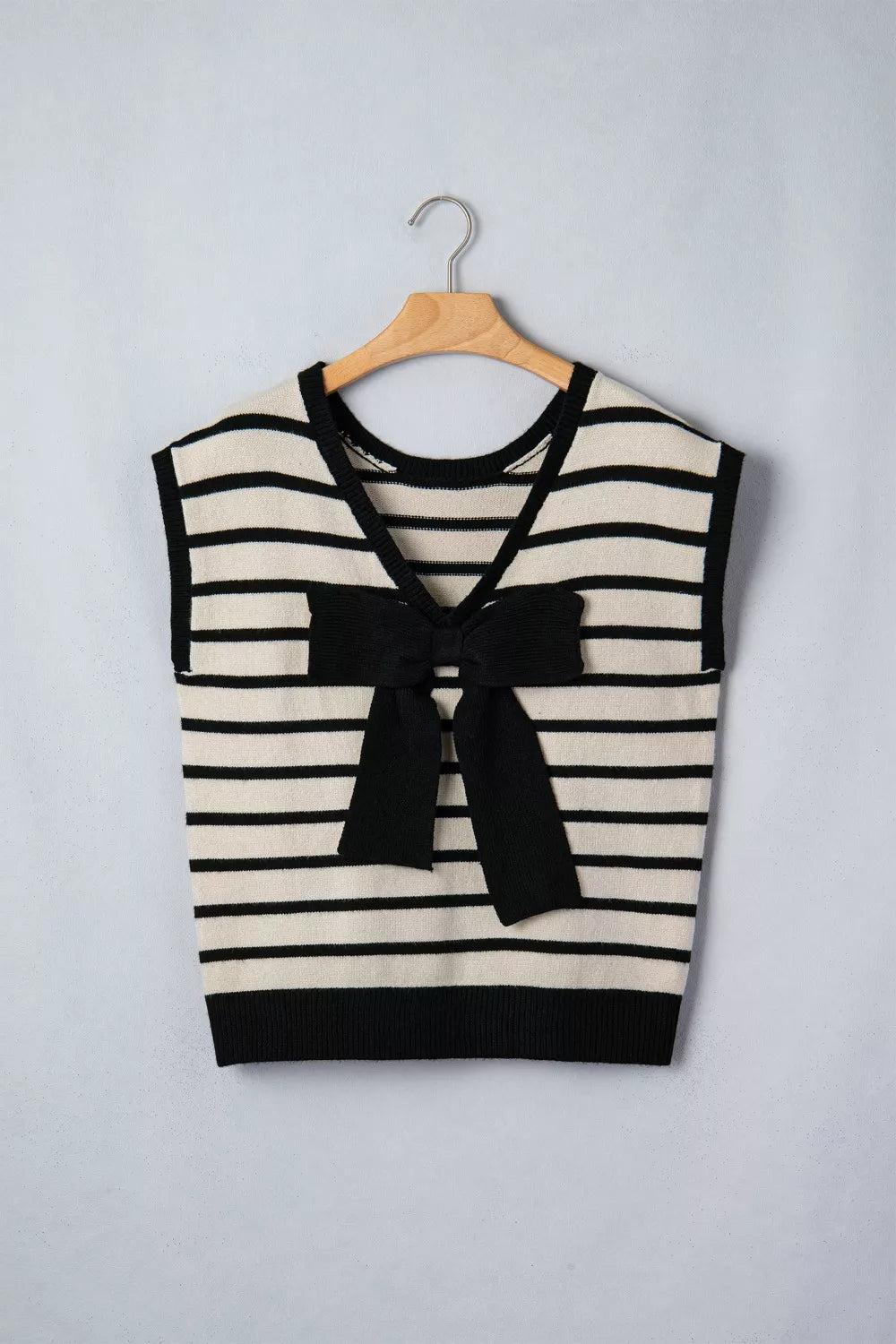 Striped short sleeve knit top with oversized bow