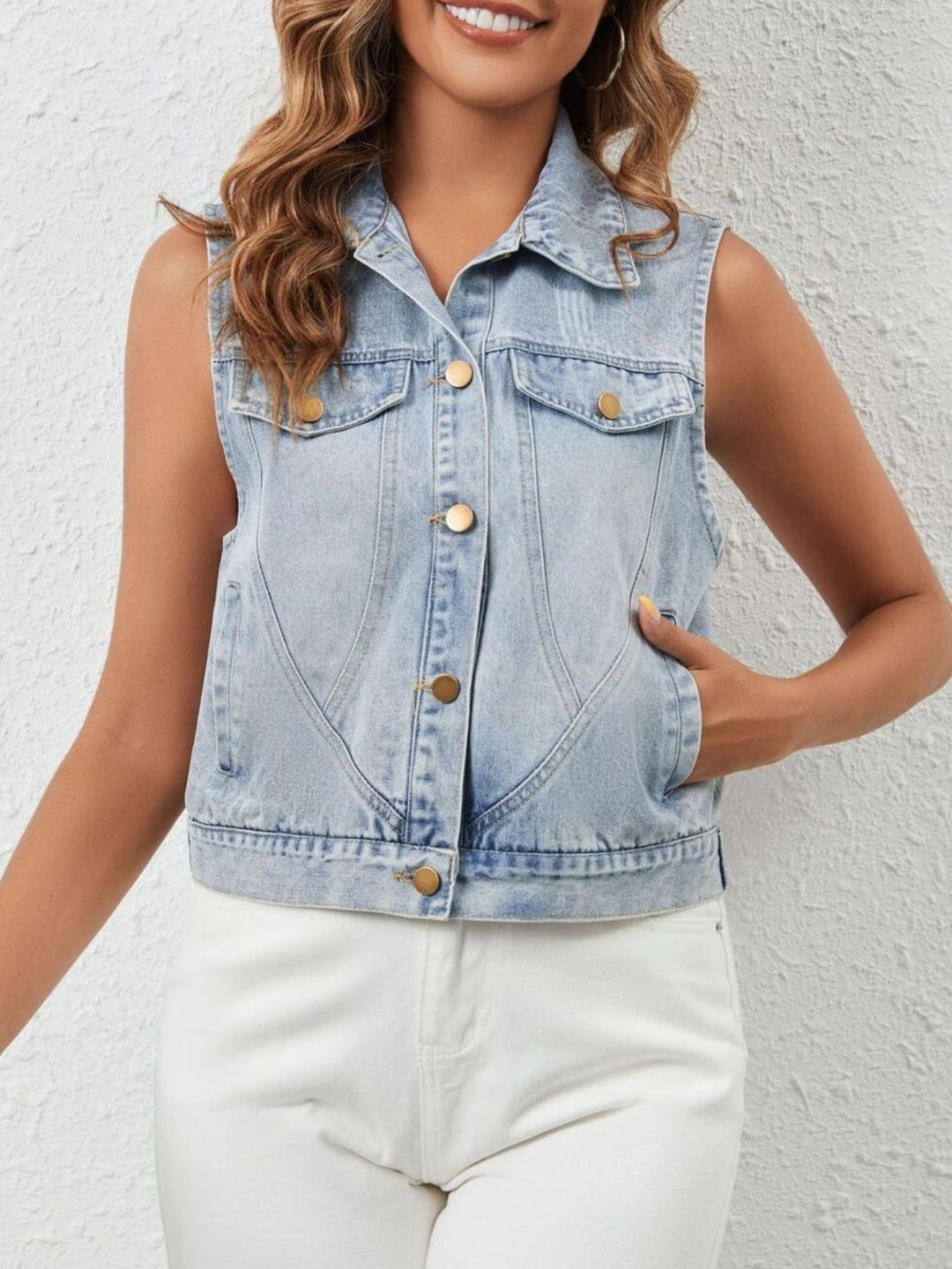 Sleeveless cropped denim vest with flap pockets