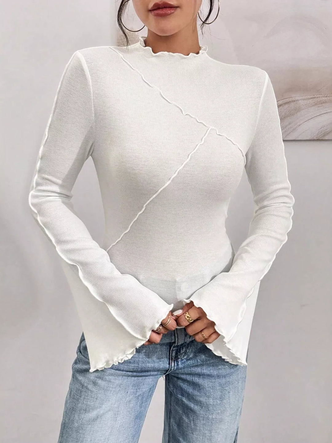 Ribbed knit mock neck top with lettuce-edge flare sleeves