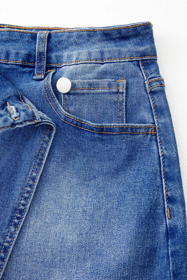 Wrap-front denim mini skirt with angled hem seam